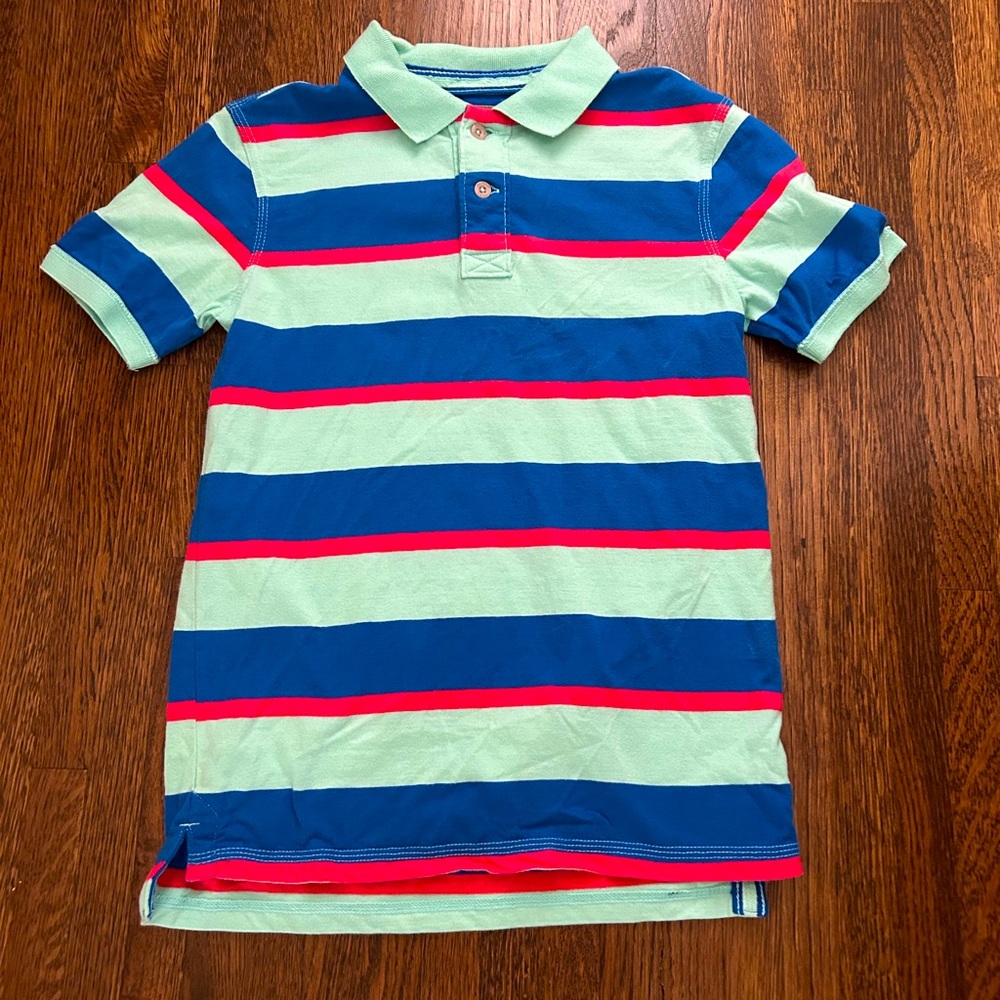 Red camel short sleeve polo shirt.